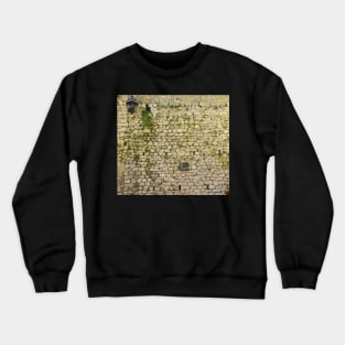 Brick wall in St. Paul de Vence, France Crewneck Sweatshirt